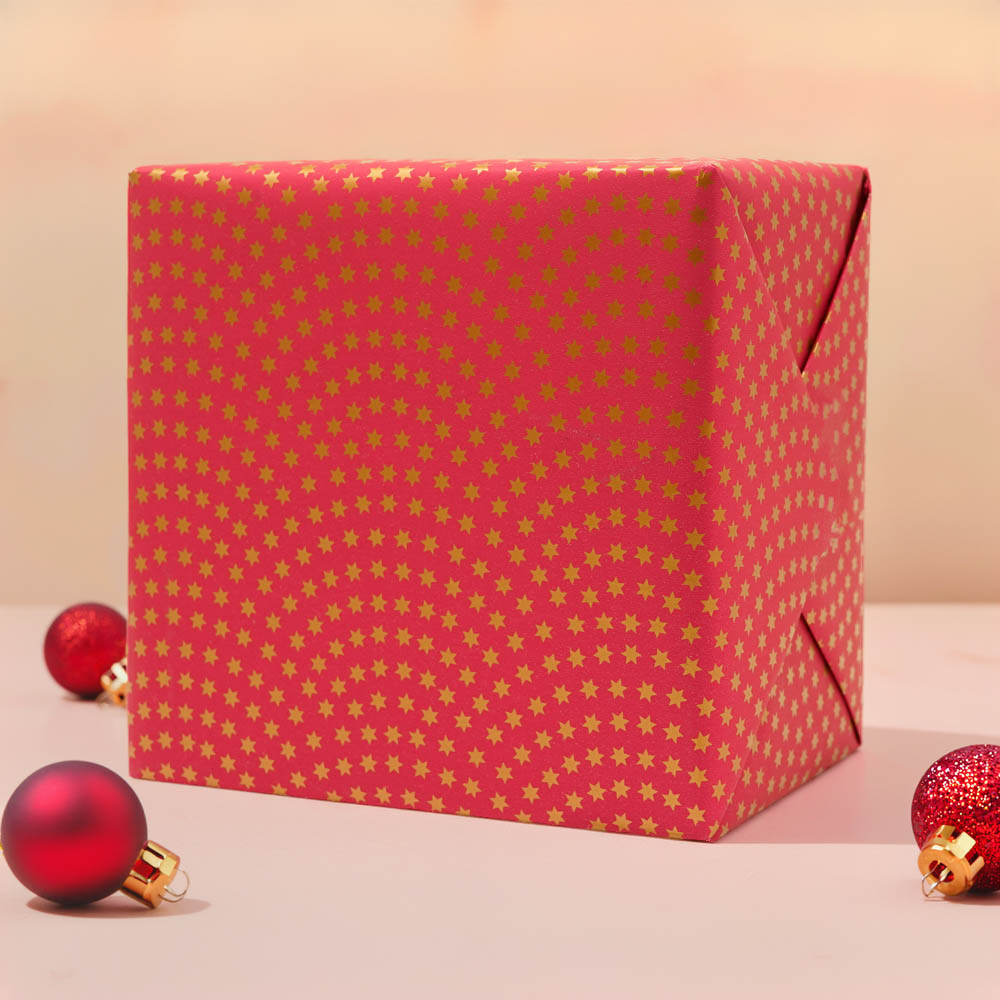 Geschenkpapiere Weihnachten Shop Rollen pink Sterne gold 50 cm