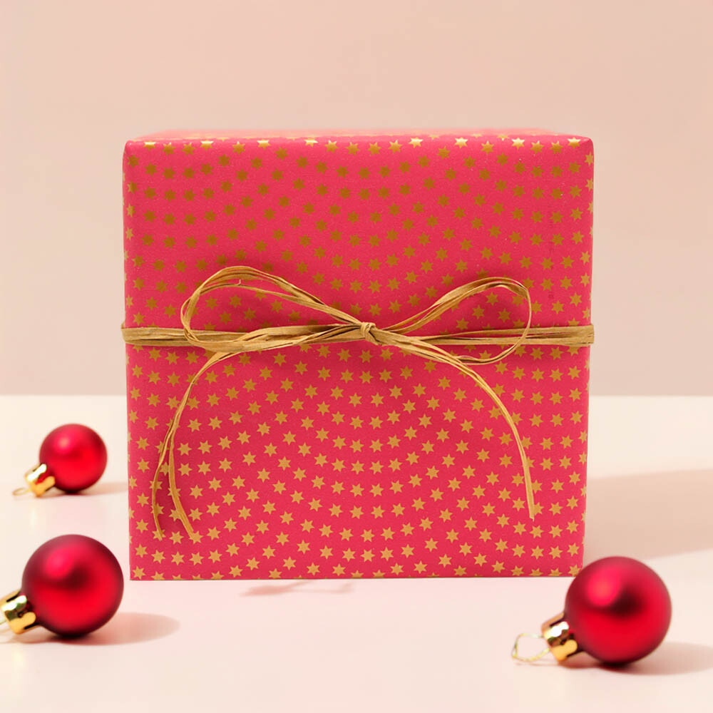 Geschenkpapiere Weihnachten Shop Rollen pink Sterne gold 70 cm