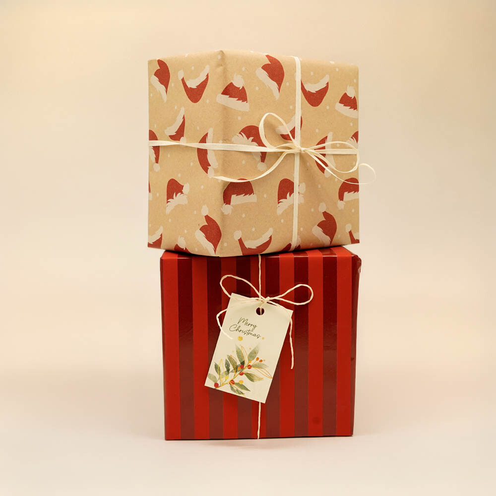 Geschenkpapiere Weihnachten Shop Rollen Weihnachtsmützen braun 70 cm