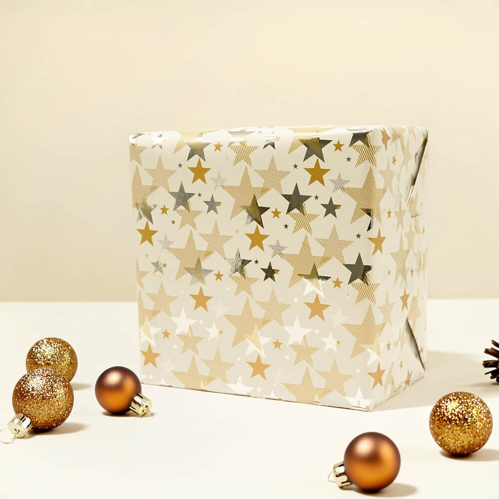 Geschenkpapiere Weihnachten Shop Rollen Sterne silber glänzend - gold Sterne mat